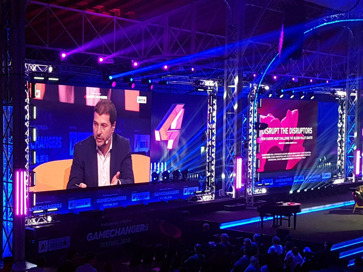 Plamen Russev speaking on the stage of 4GameChangers
